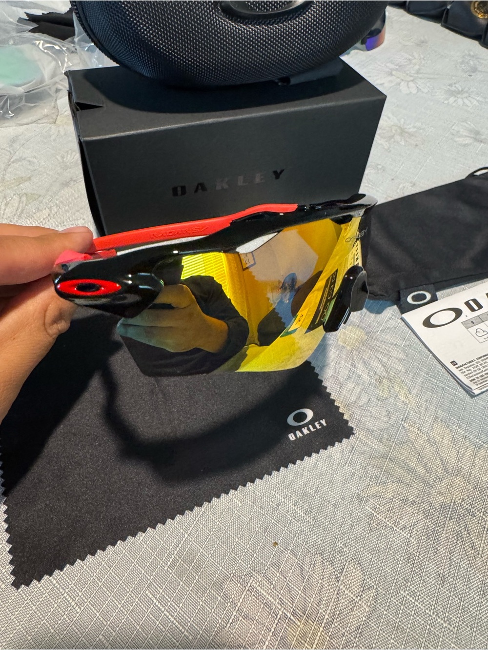 Oakley sports sunglasses — Black frame with Red temples and Yellow mirrored lens